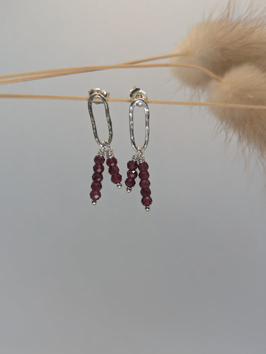 Silver stud with faceted tiny garnet rondelles